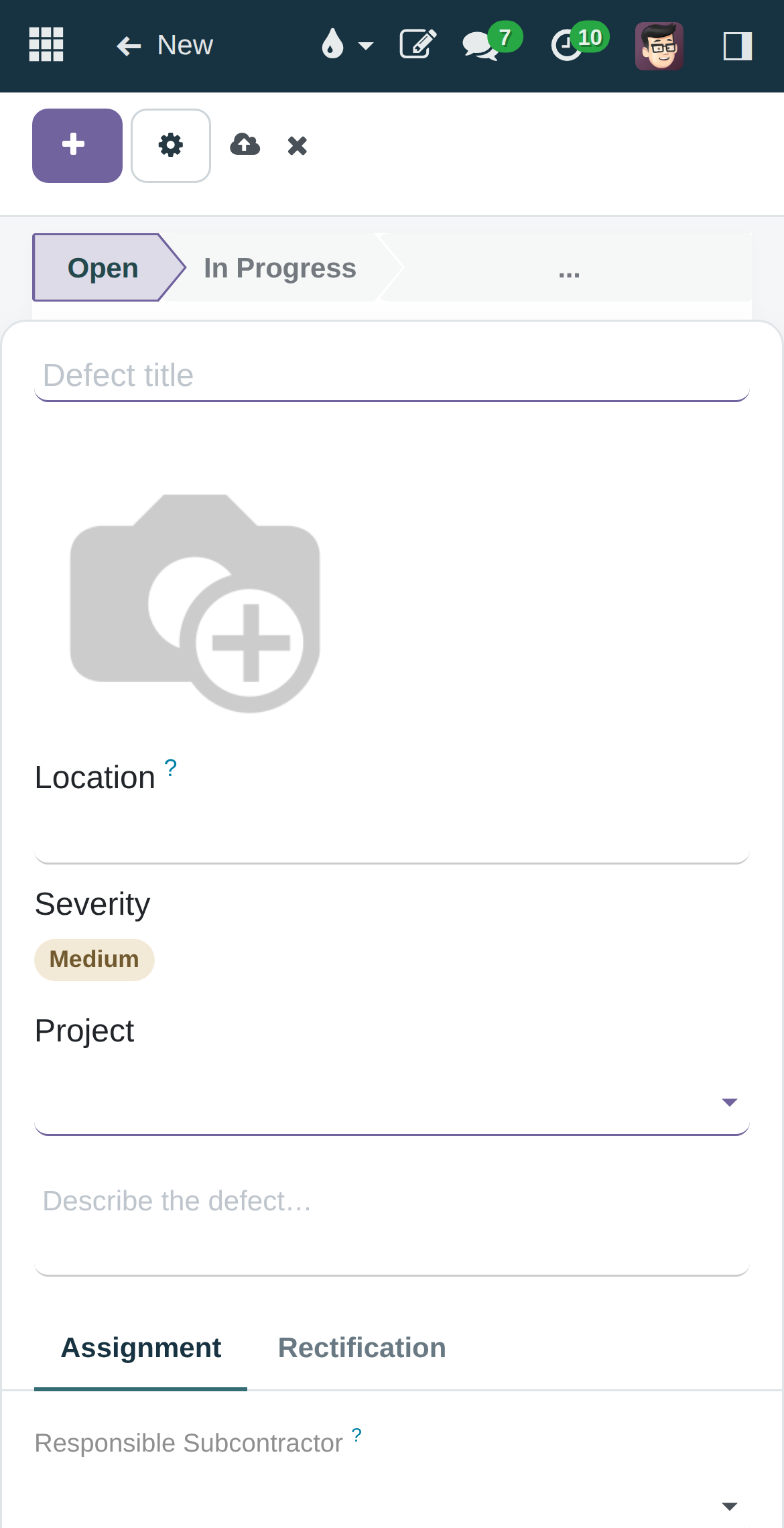 Raising a defect on a phone-width screen: title field, then the photo capture control, then location, severity, project and description, all above the fold.